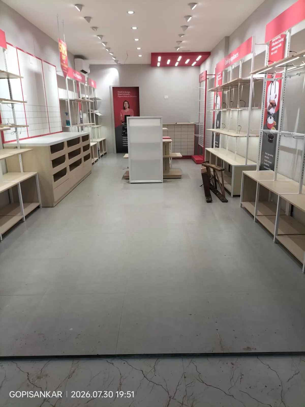 Pigeon store interior shelving and cookware display
